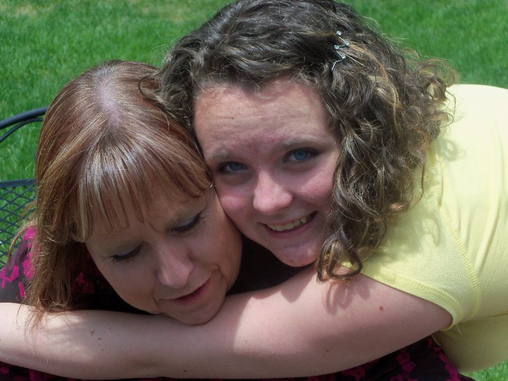 Elaine Lainee sharing a quiet hug with Niqelle  a moment of love and connection